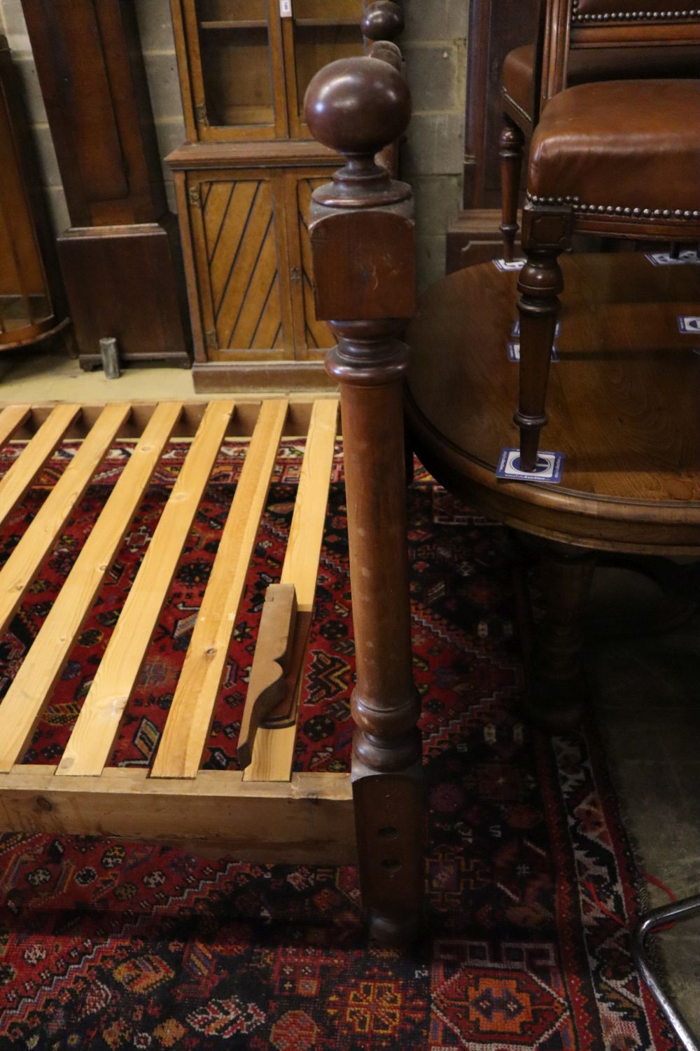 A Victorian mahogany three quarter size head and foot bedstead, width 137cm